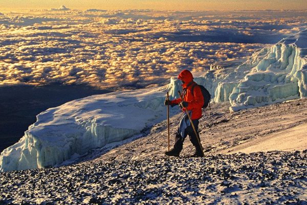 2-slide-kilimanjaro-trek-climber-pano